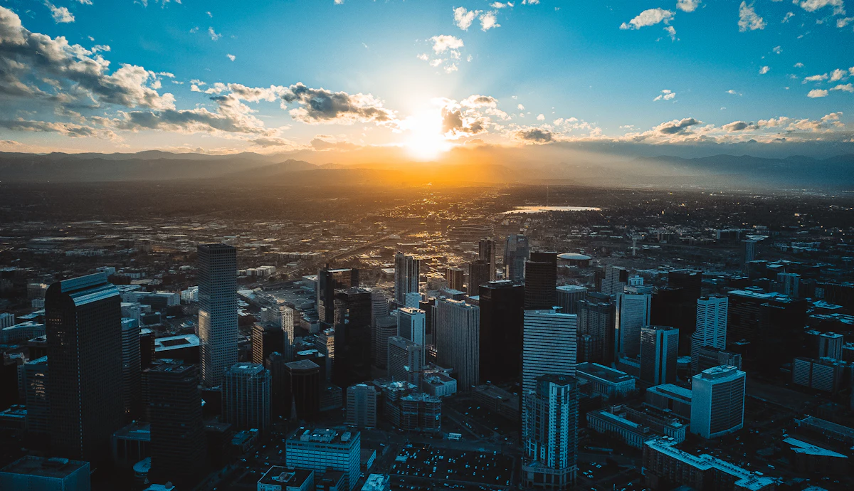 Denver skyline with the Front Range behind it on a clear dry day