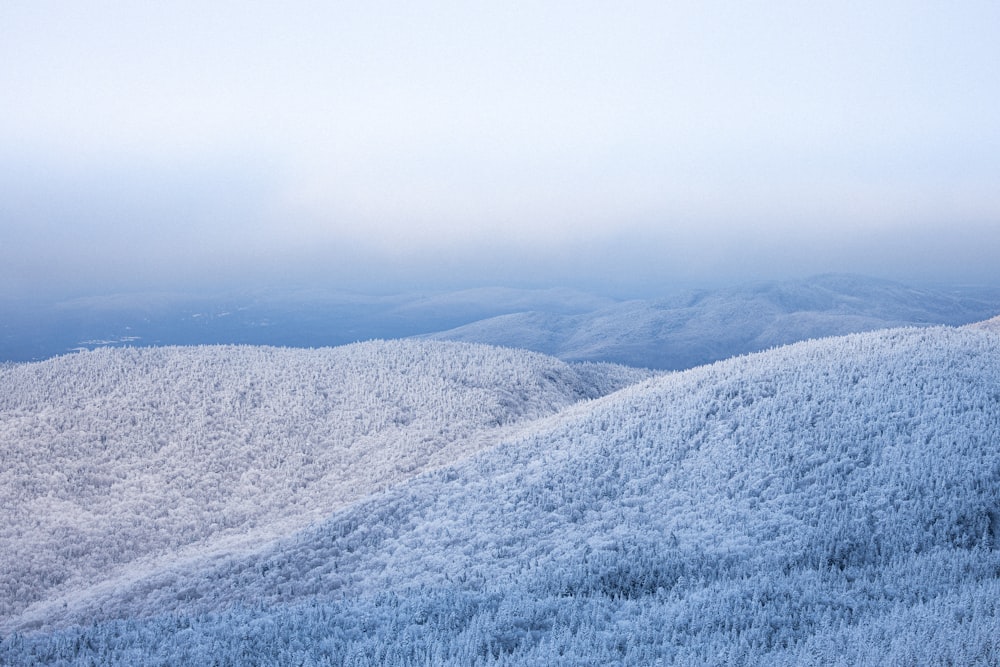 a view of a snowy mountain range from a distance