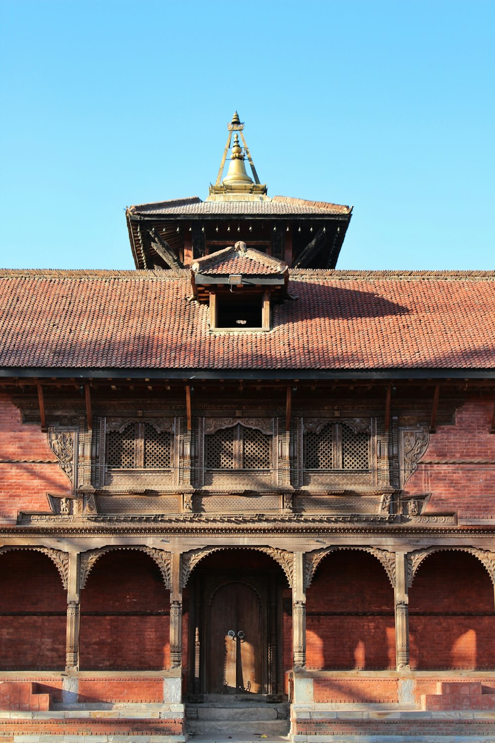 a large building with a bell tower on top of it