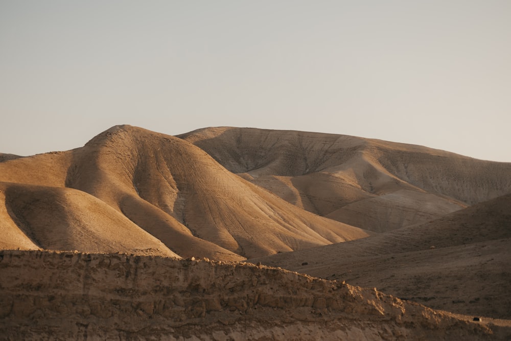 a mountain range in the middle of a desert