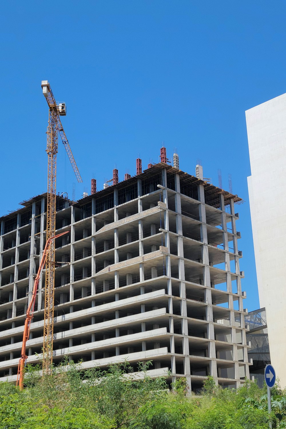 a large building with a crane on top of it