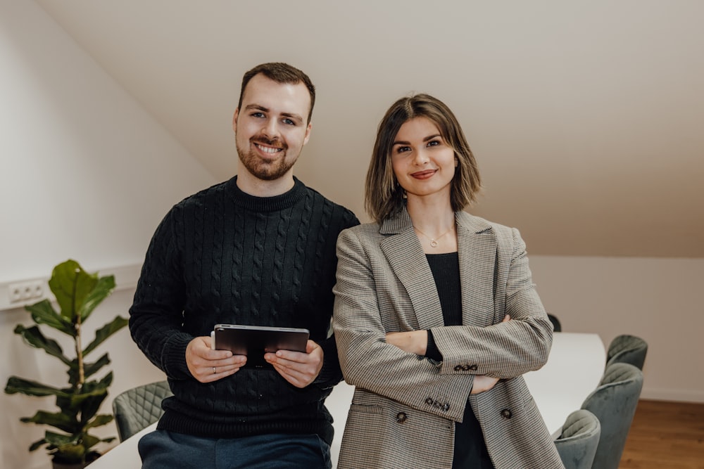 a man and a woman standing next to each other