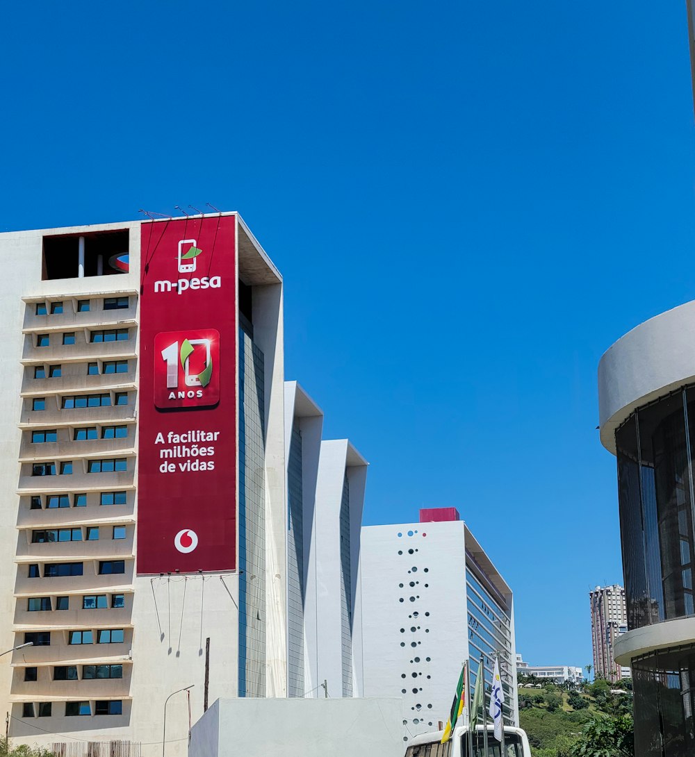 a tall building with a sign on the side of it