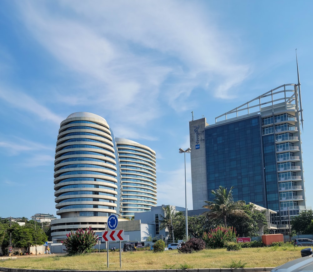 a very tall building sitting next to a road