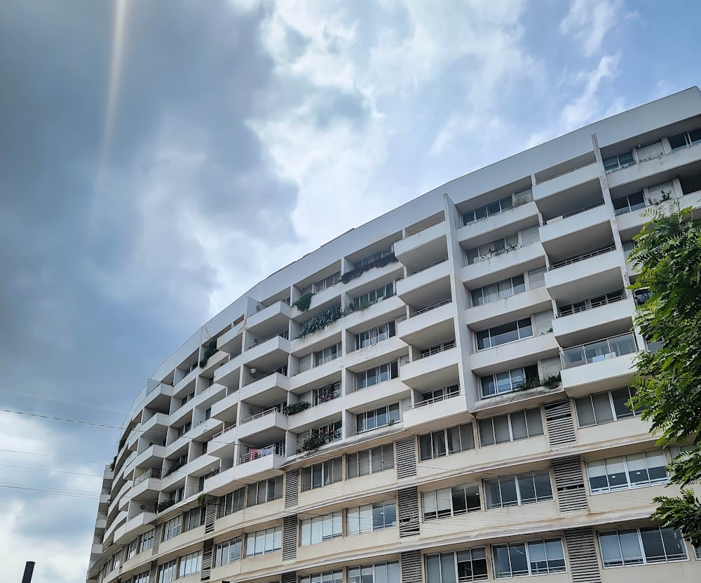 a tall building with balconies and balconies on it