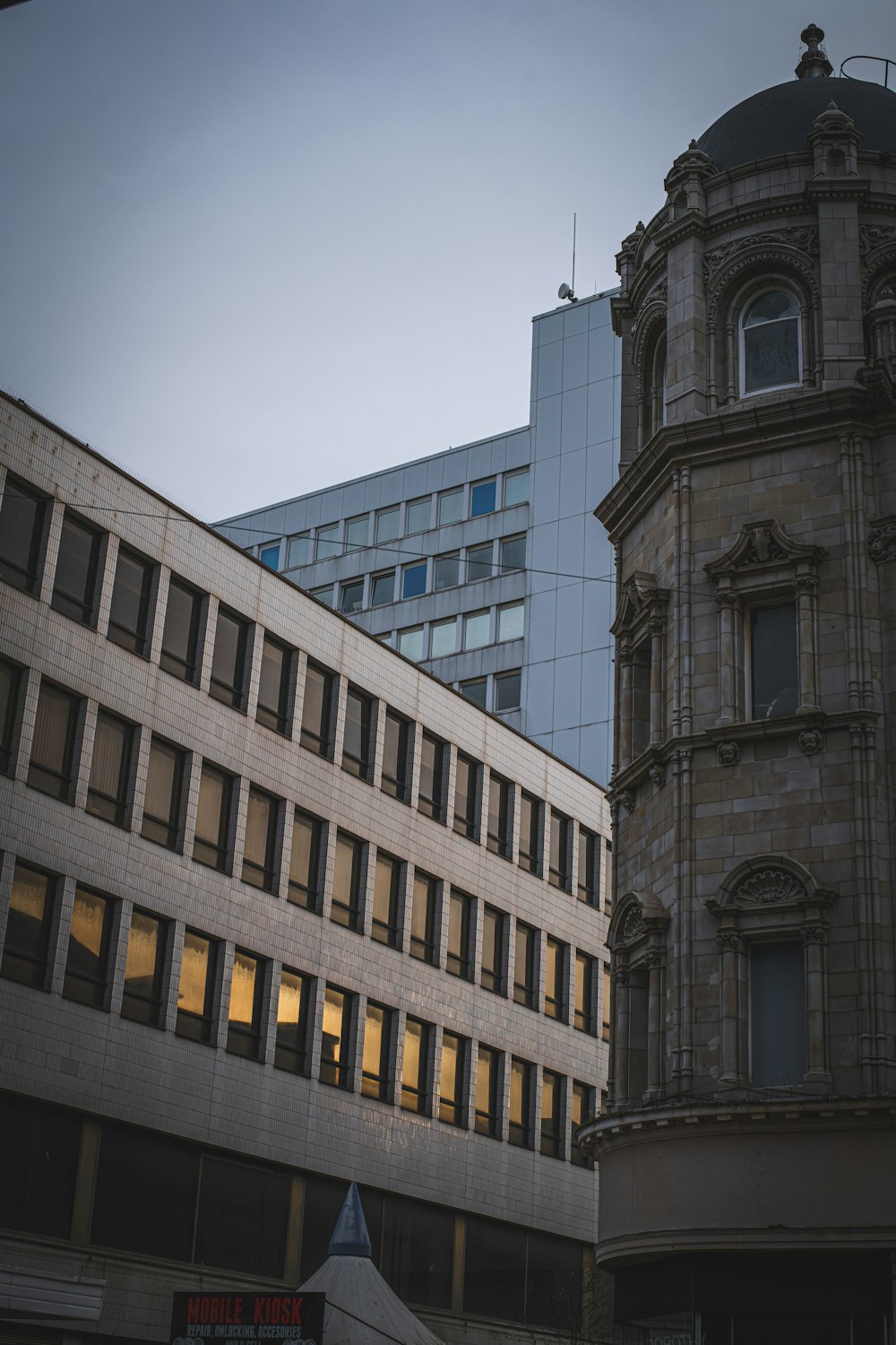 a large building with a clock on the front of it