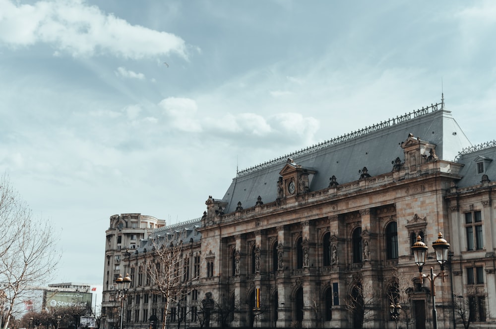 a large building with a clock on the top of it