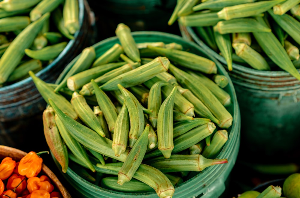 a pile of green beans and other vegetables