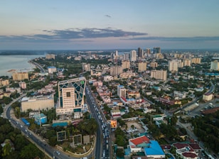 an aerial view of a city with tall buildings