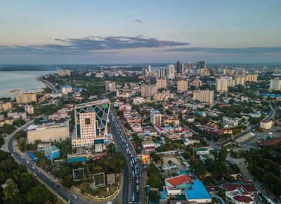 an aerial view of a city with tall buildings