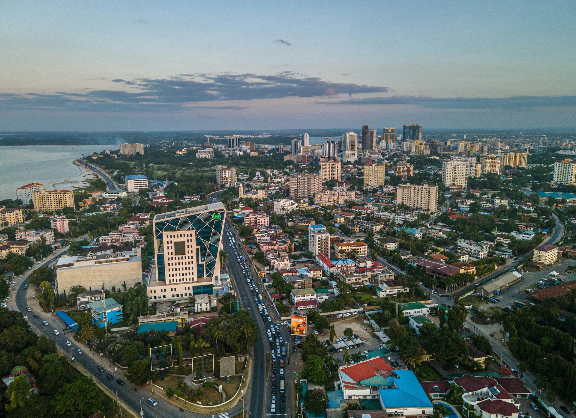 an aerial view of a city with tall buildings