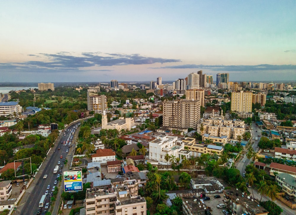 an aerial view of a city with tall buildings