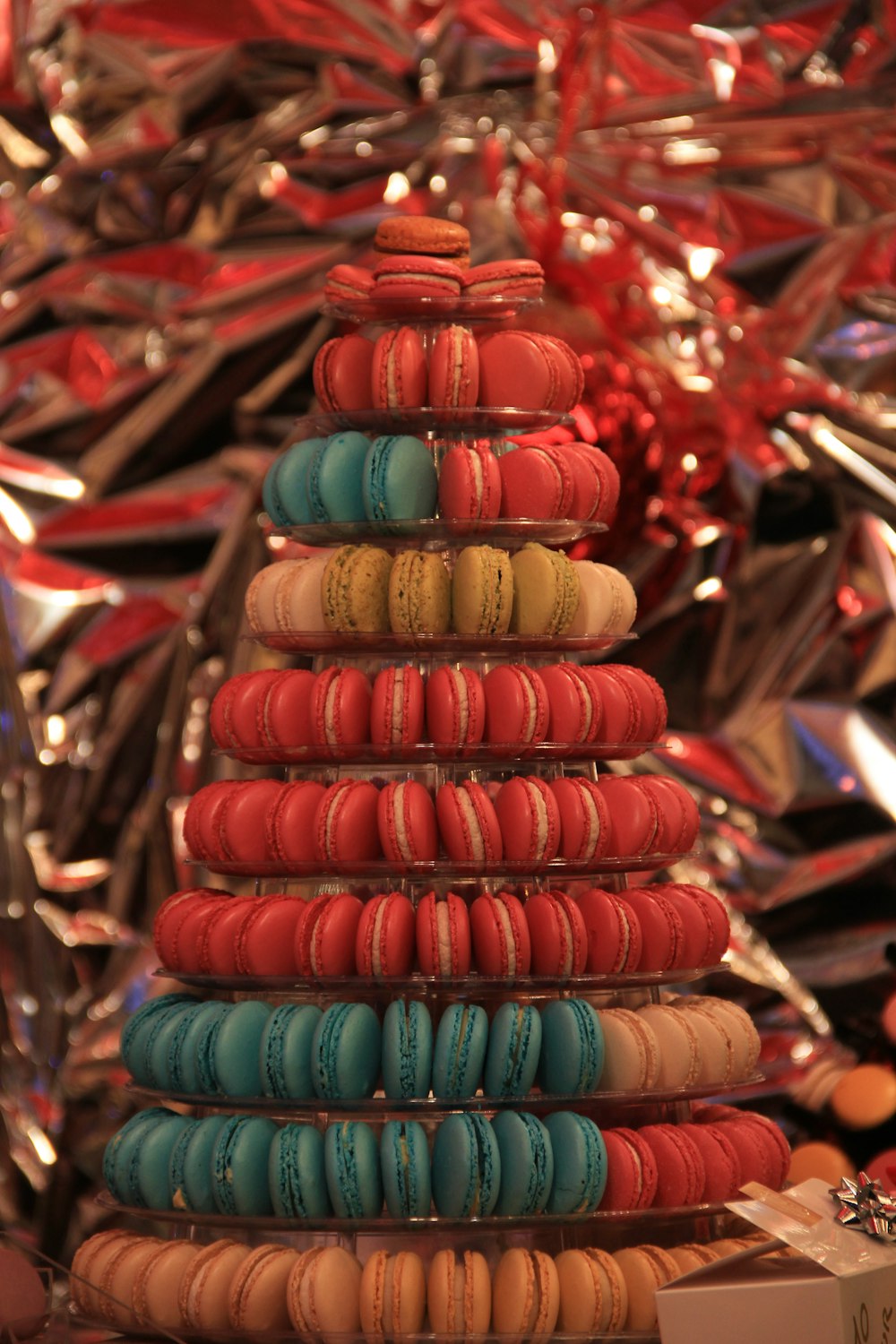 a stack of colorful macaroons sitting on top of each other