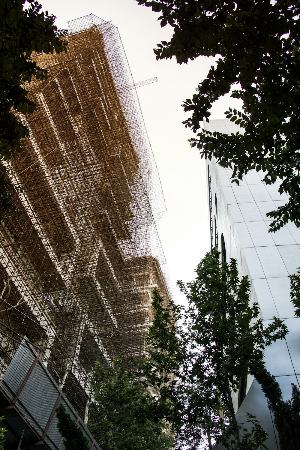 a very tall building with a bunch of scaffolding on it