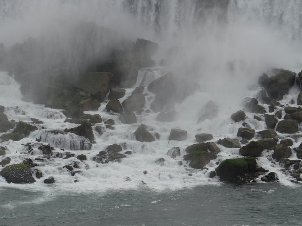 a large waterfall with lots of water coming out of it