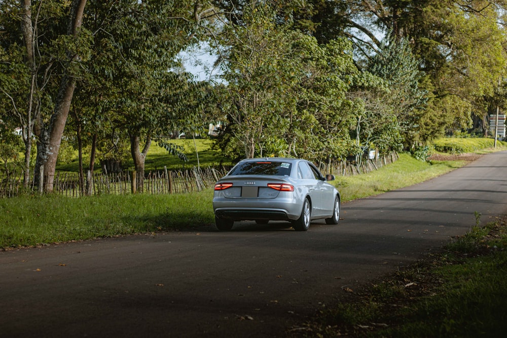 a car is parked on the side of the road