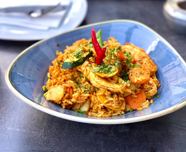 a plate of food that is on a table