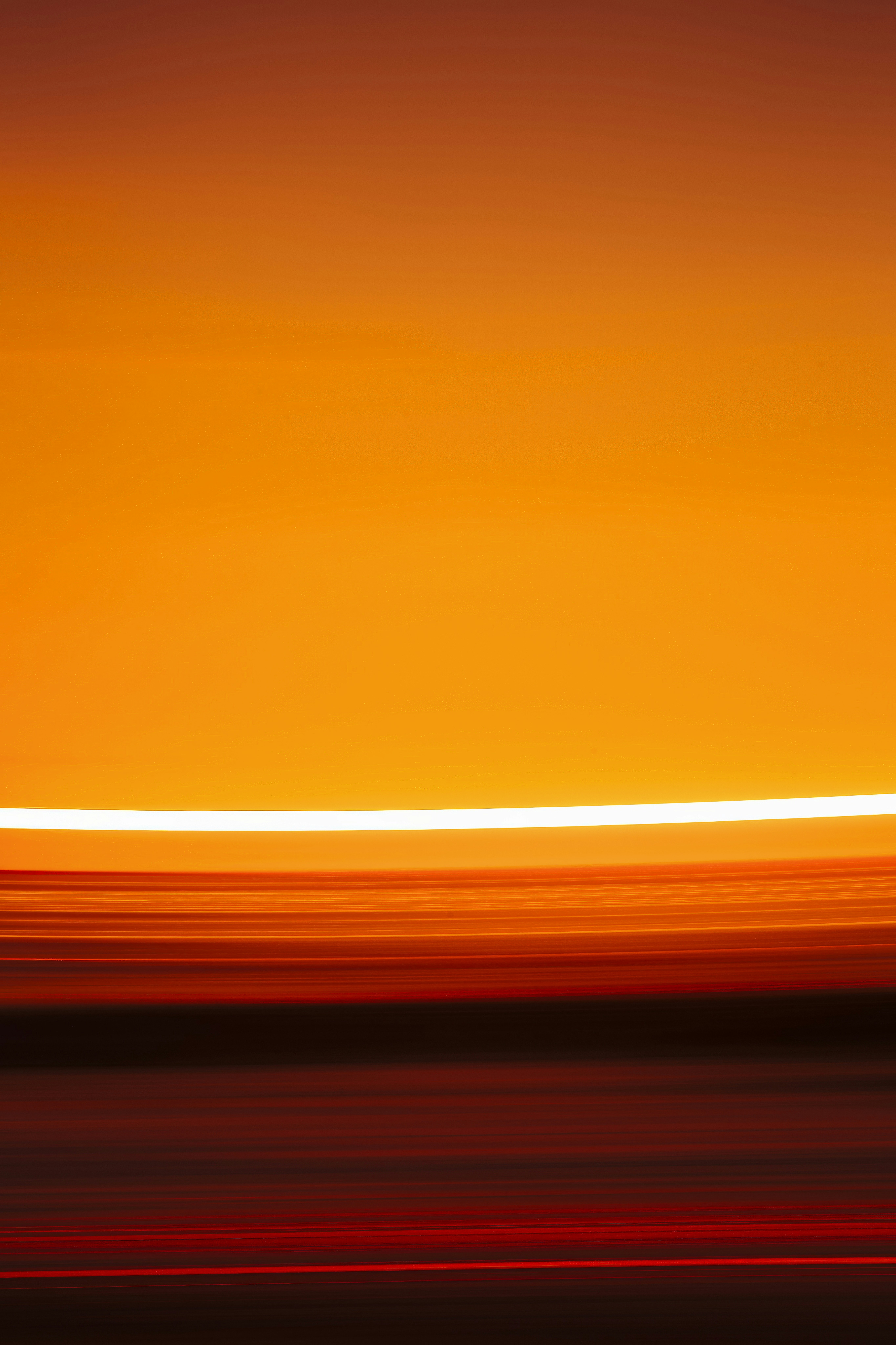 a blurry photo of a plane flying in the sky