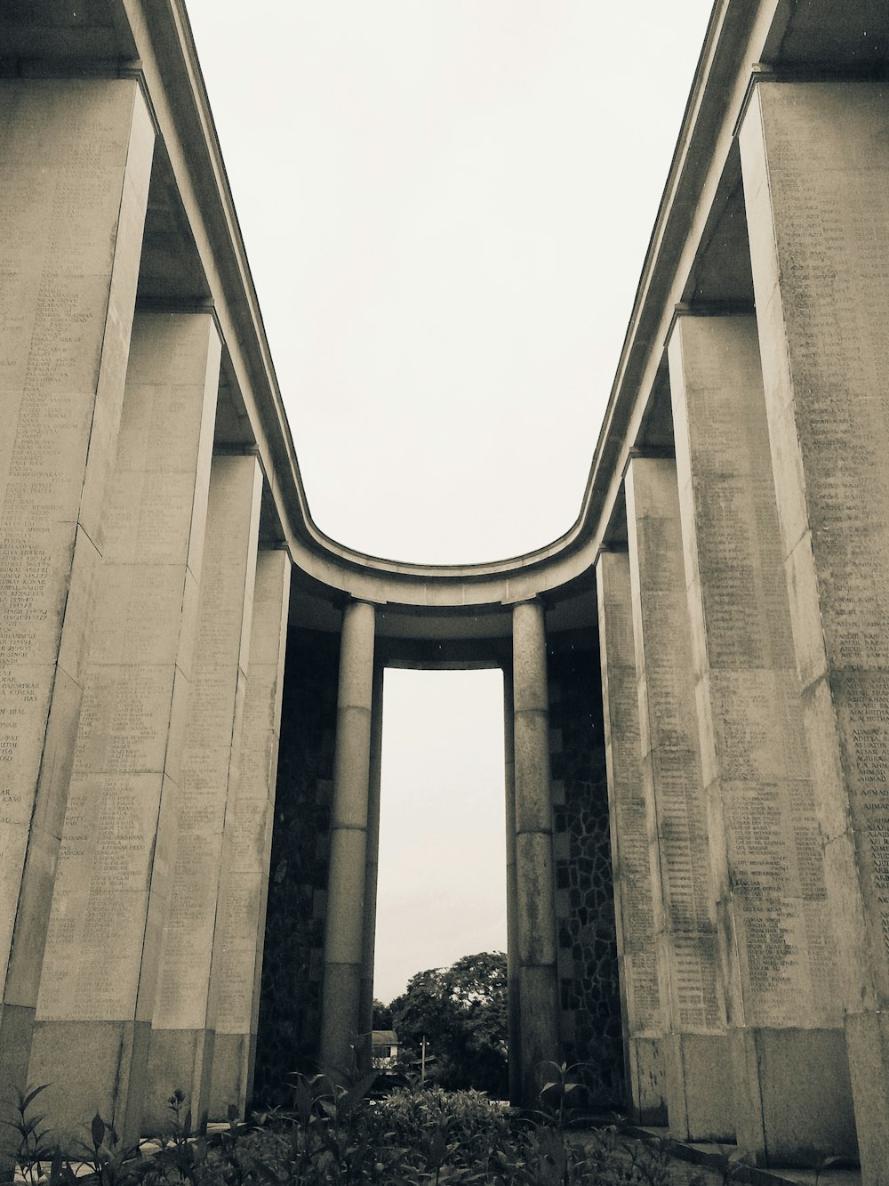 a very tall bridge with a sky background