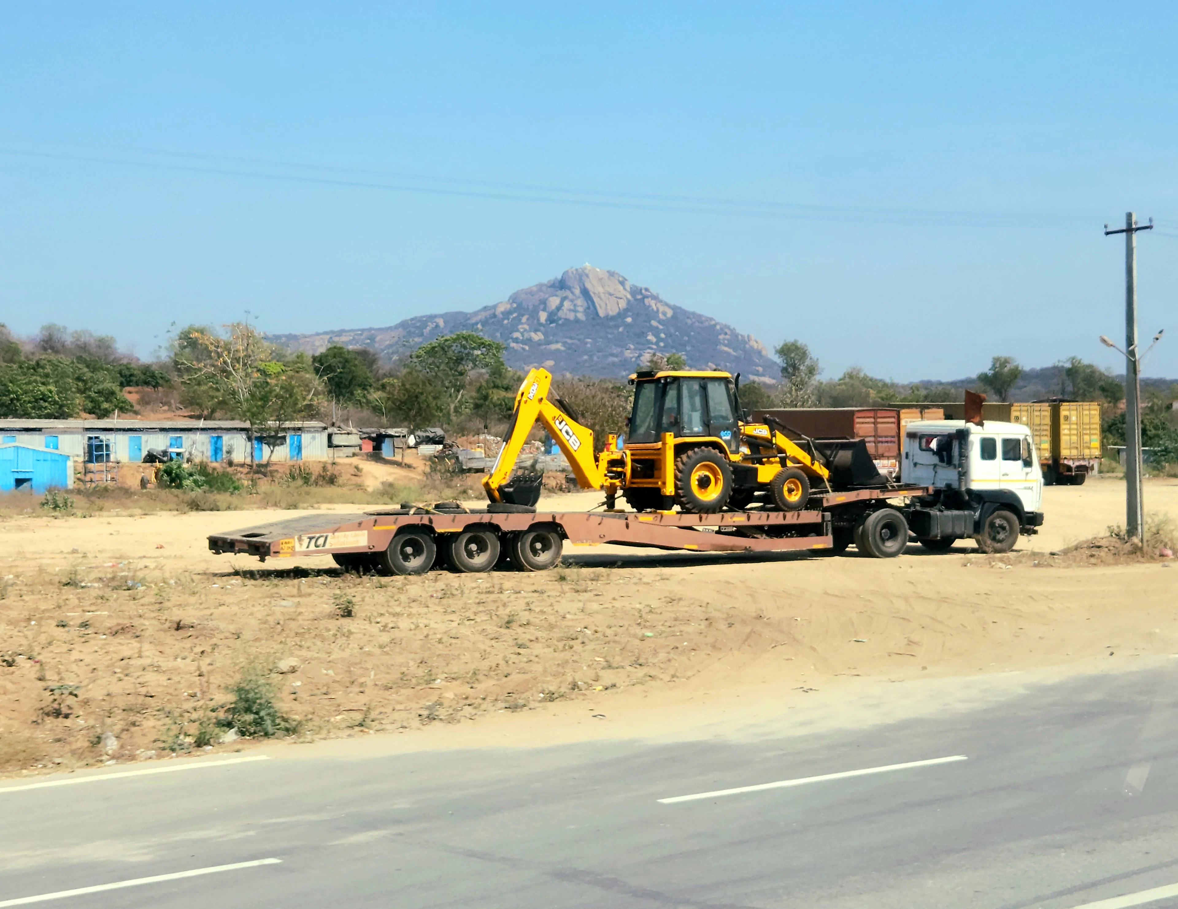 Heavy-haul trailer transporting oversized construction equipment