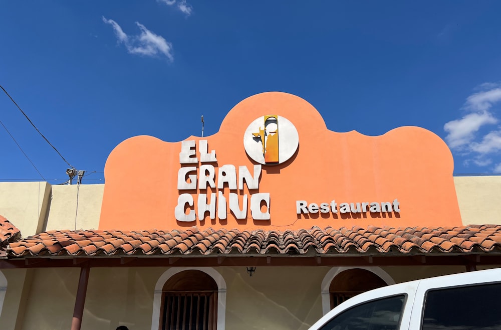 a building with a sign that says el gran chino restaurant