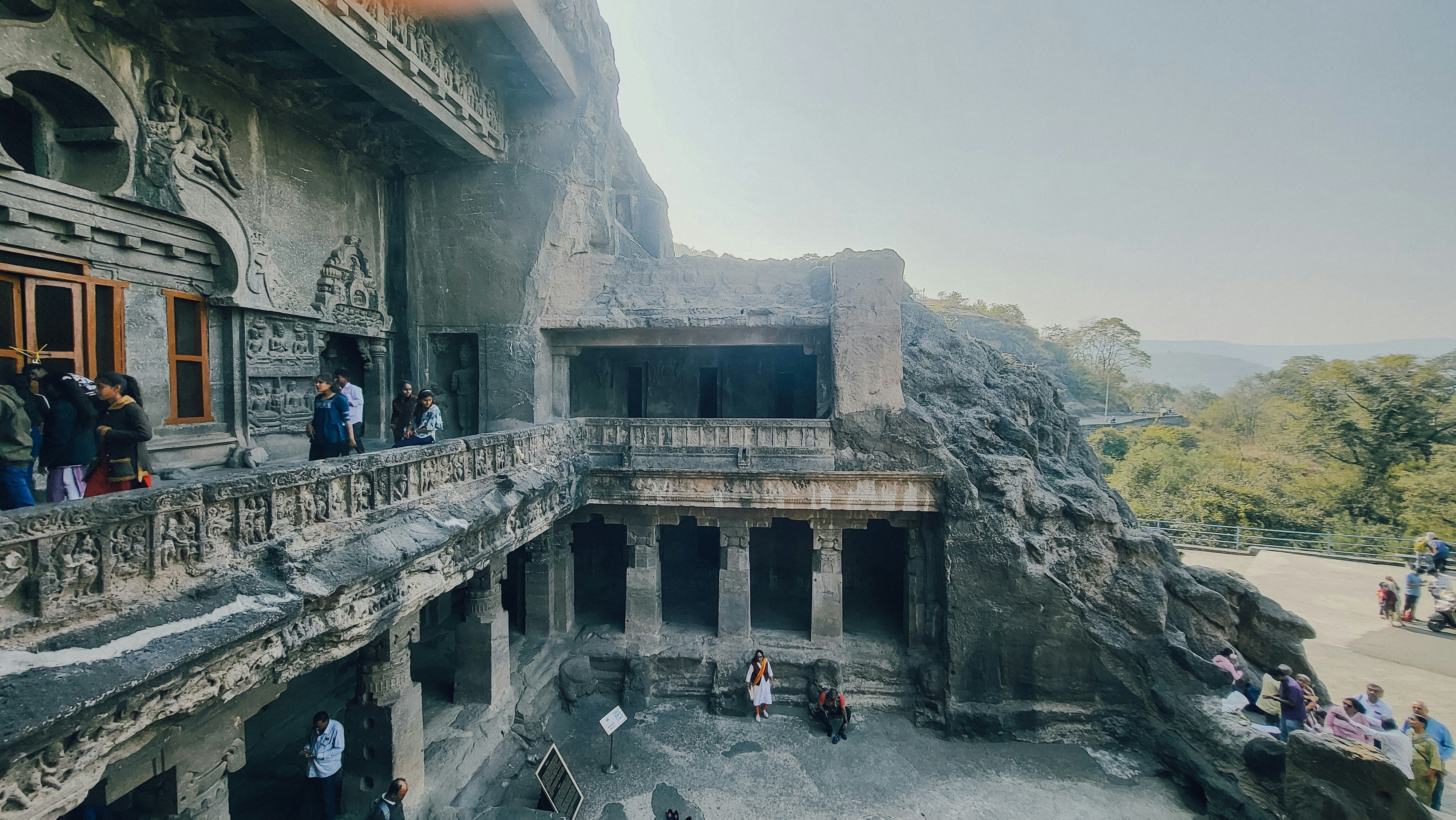 a group of people standing outside of a building