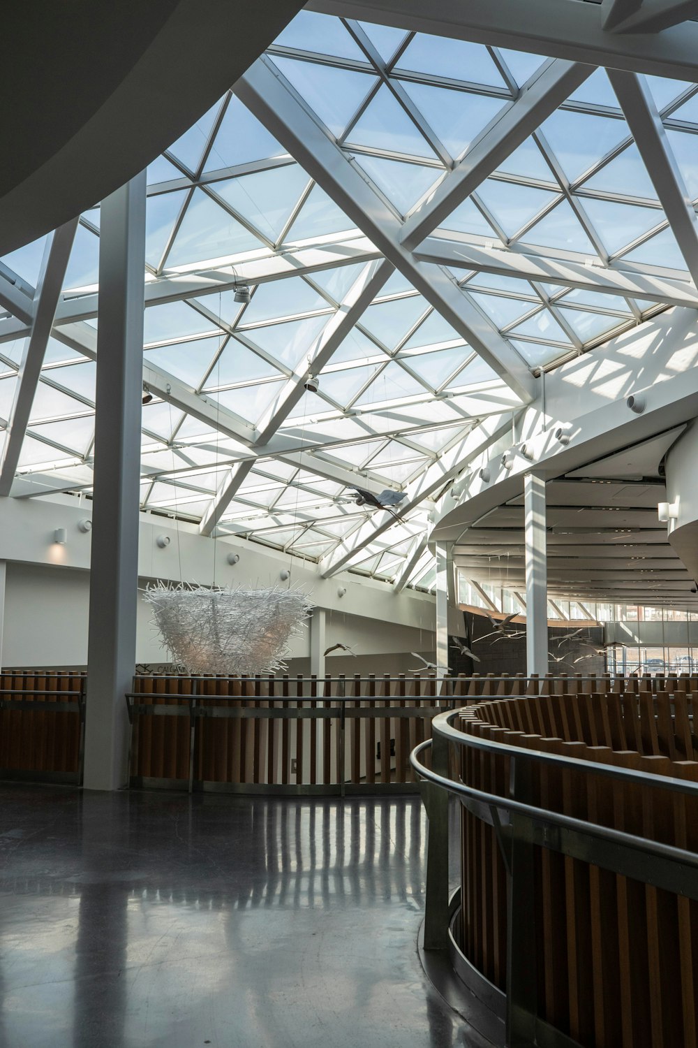 the inside of a building with a glass roof