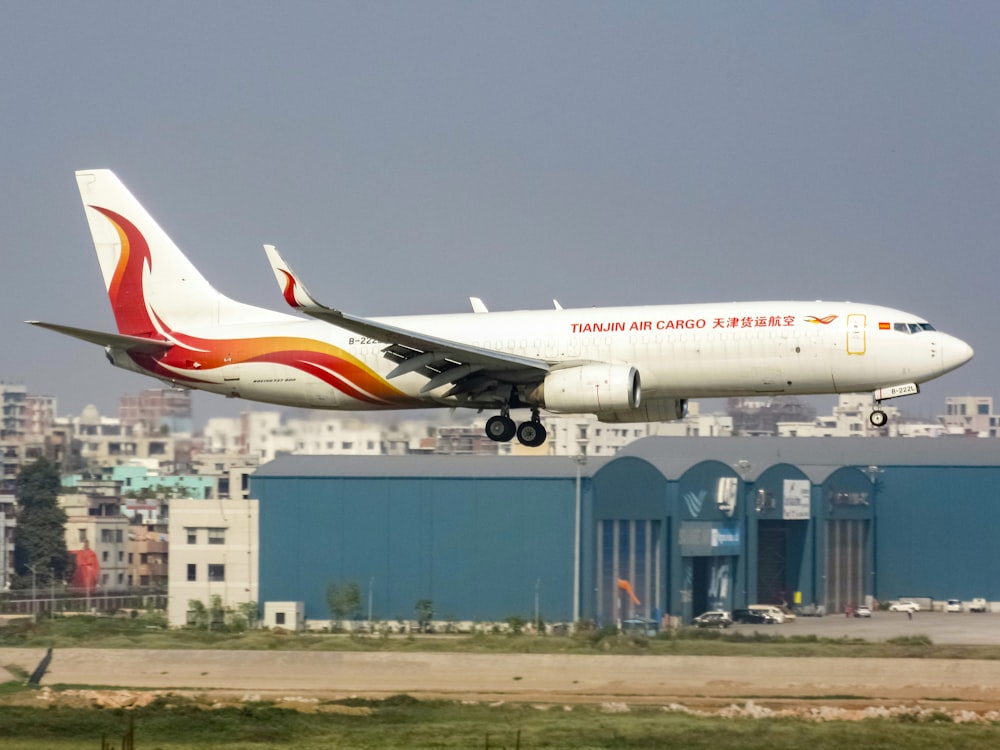 a large jetliner taking off from an airport runway