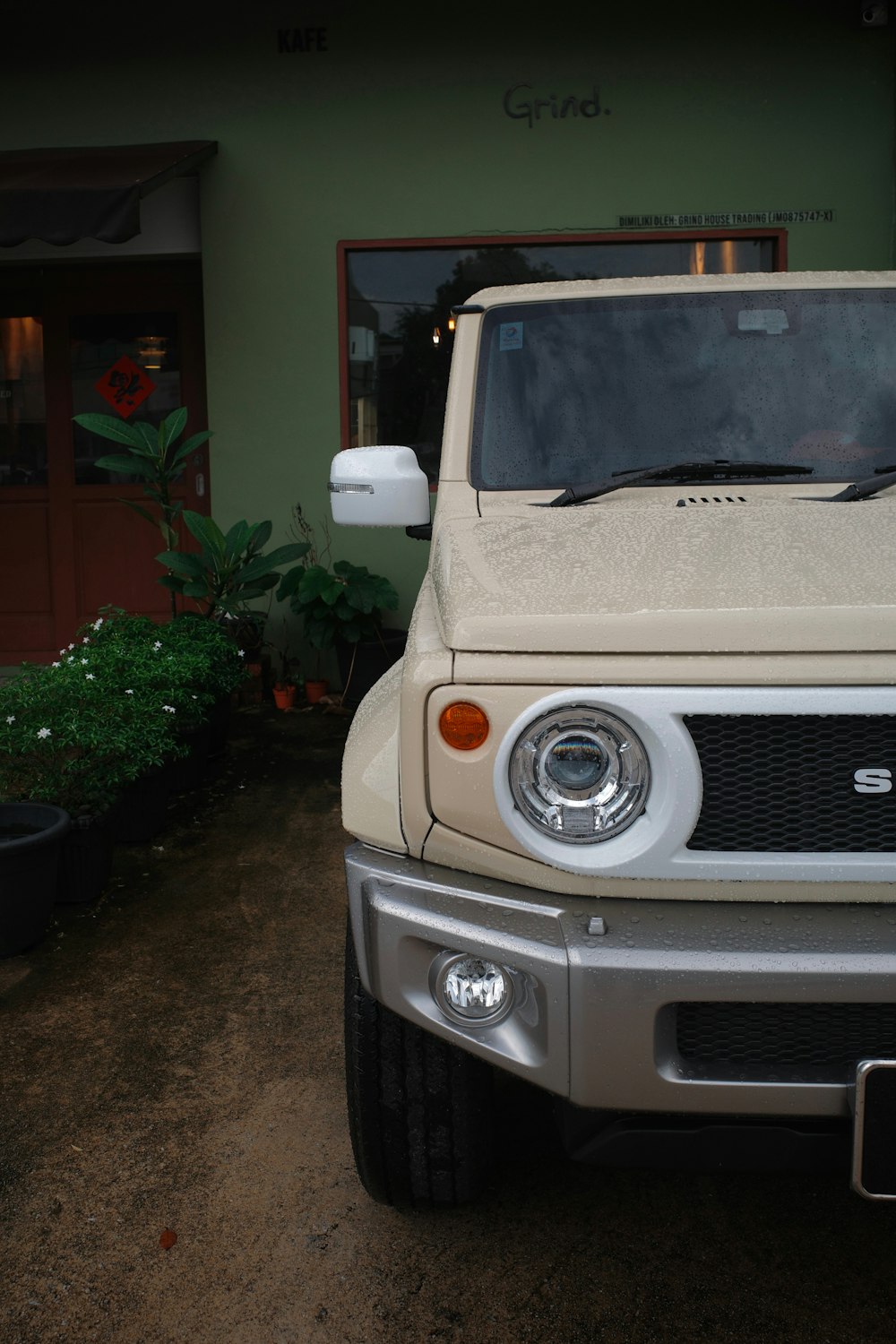 a white truck parked in front of a building