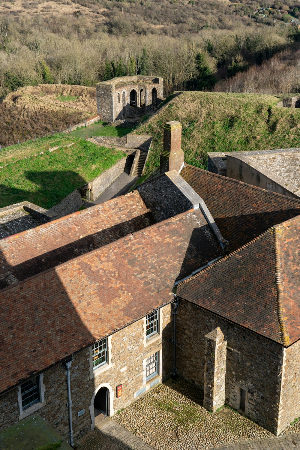 an aerial view of an old brick building