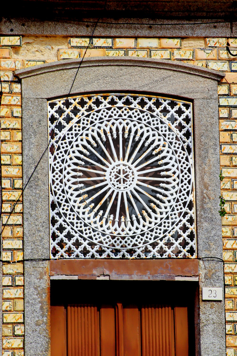 a building with a decorative window on the side of it