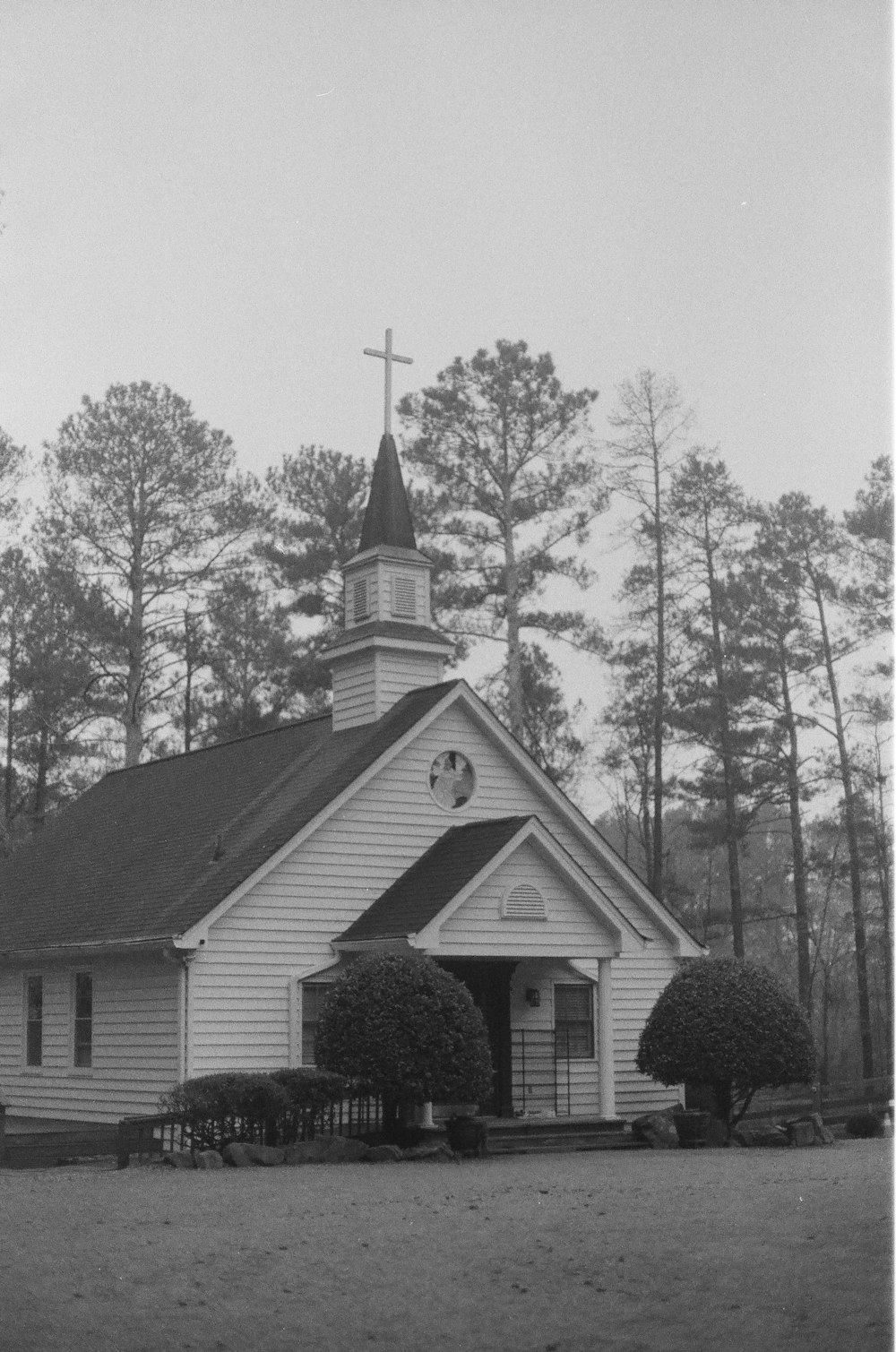 a black and white photo of a church