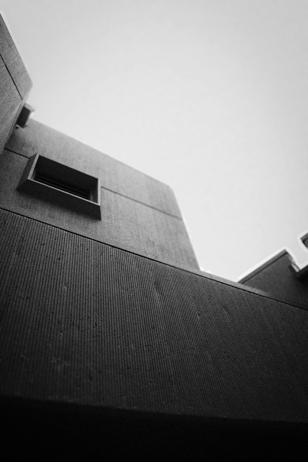 a black and white photo of a tall building