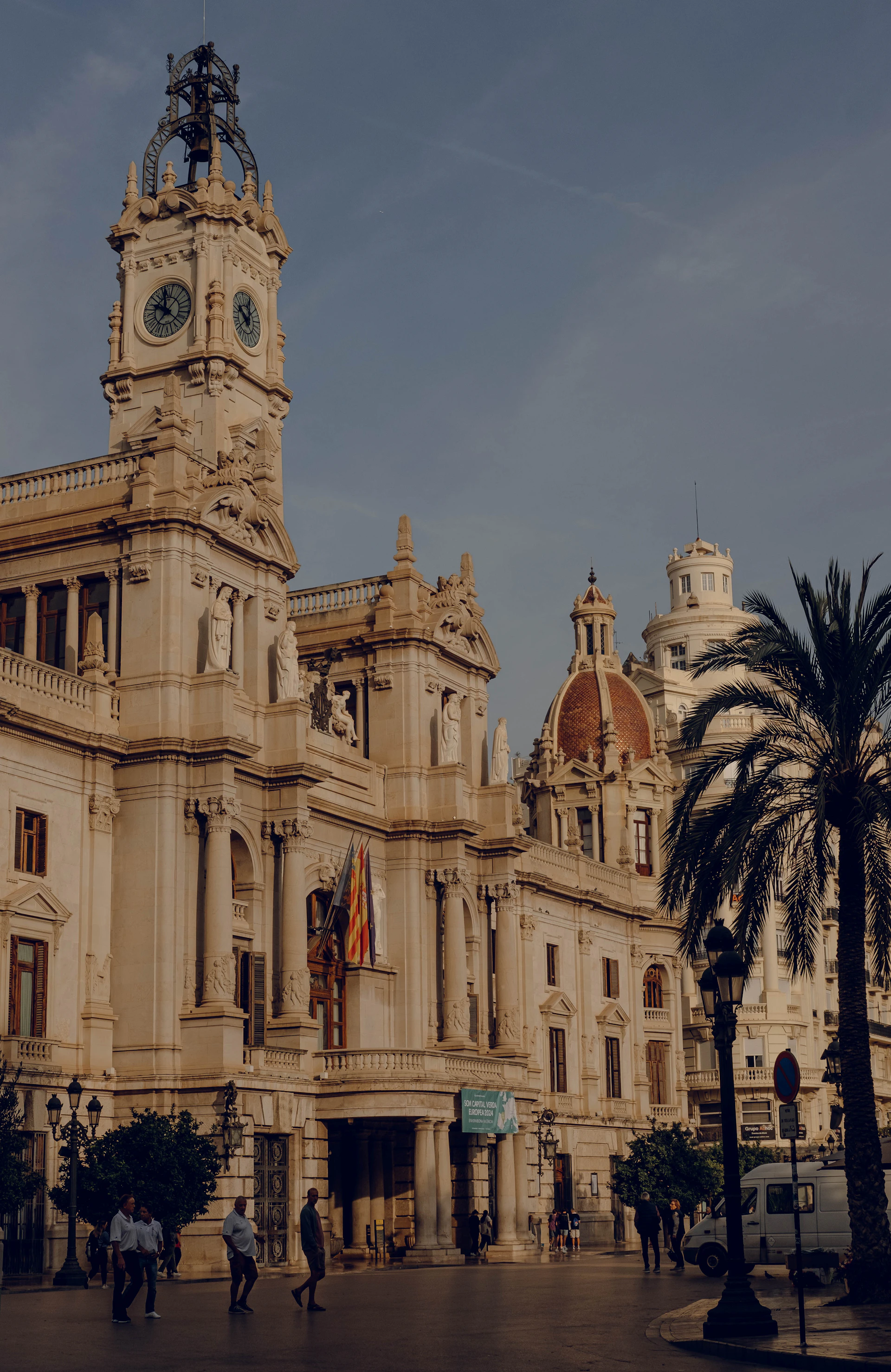 a large building with a clock on the top of it