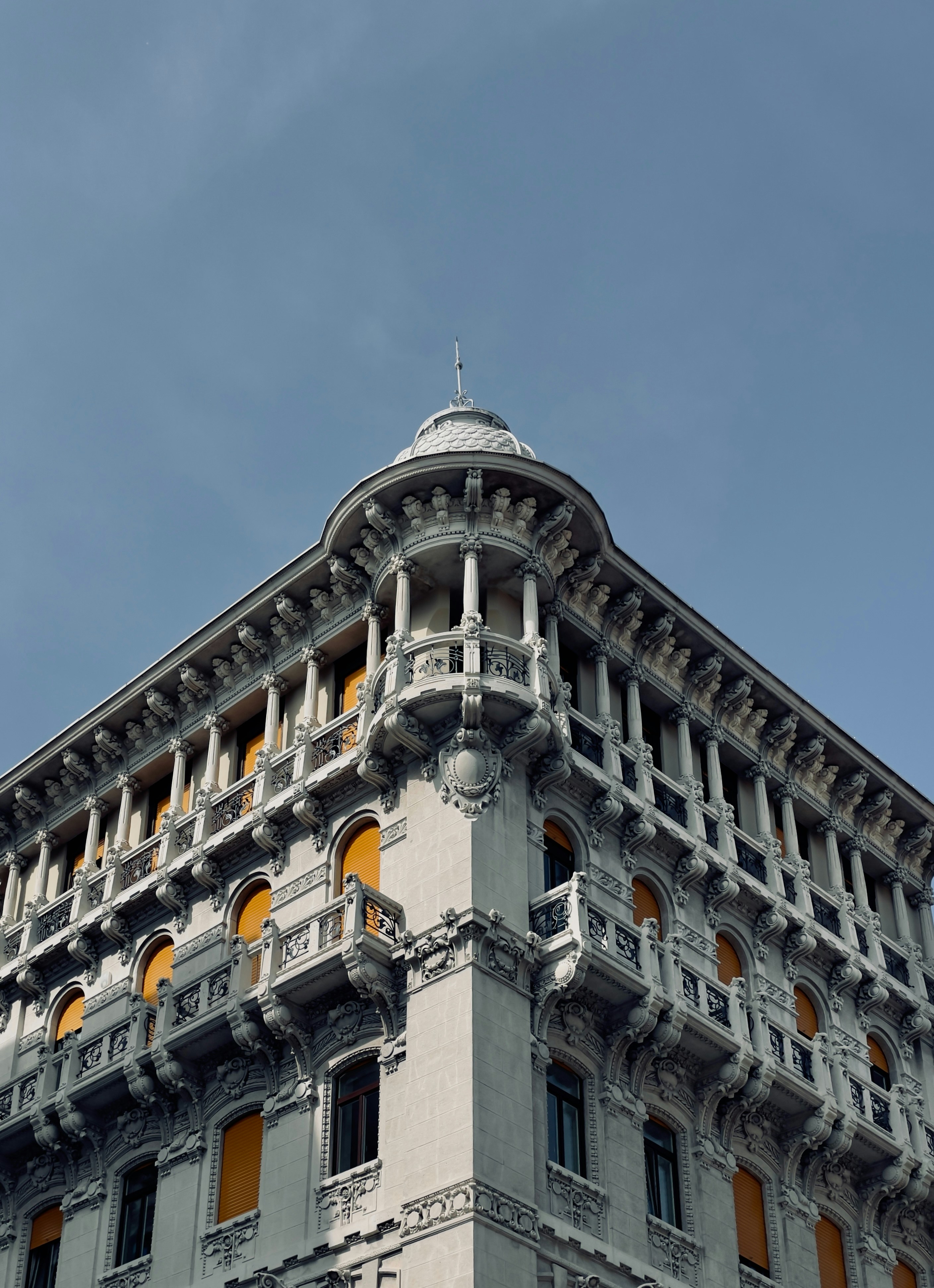 a tall building with a clock on the top of it