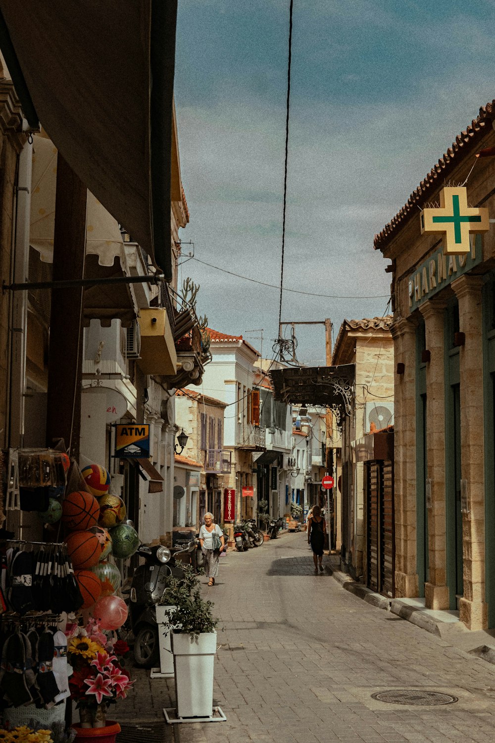 a street with a cross on the top of it