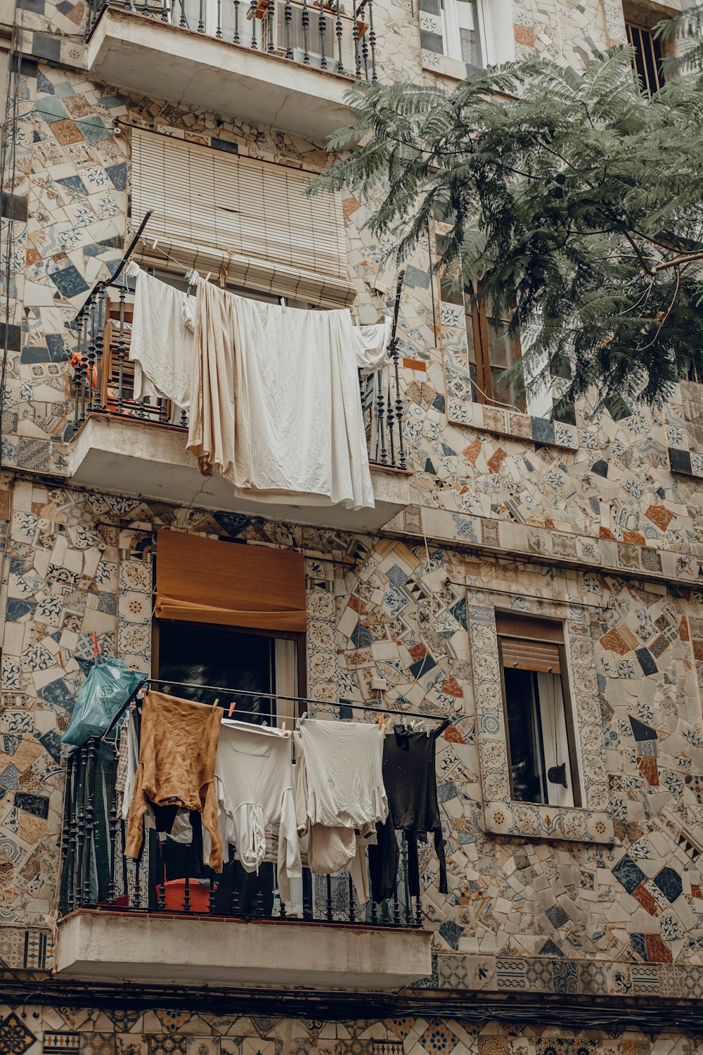 clothes hanging out to dry on a balcony