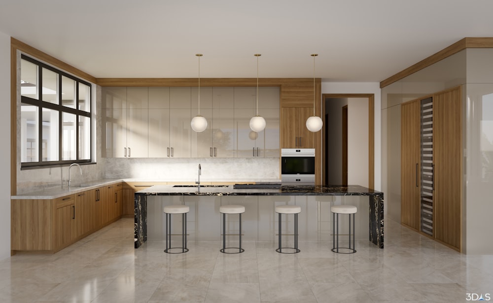 a kitchen with a marble counter top and bar stools