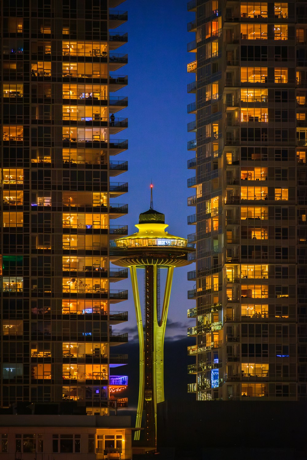 a view of the space needle at night