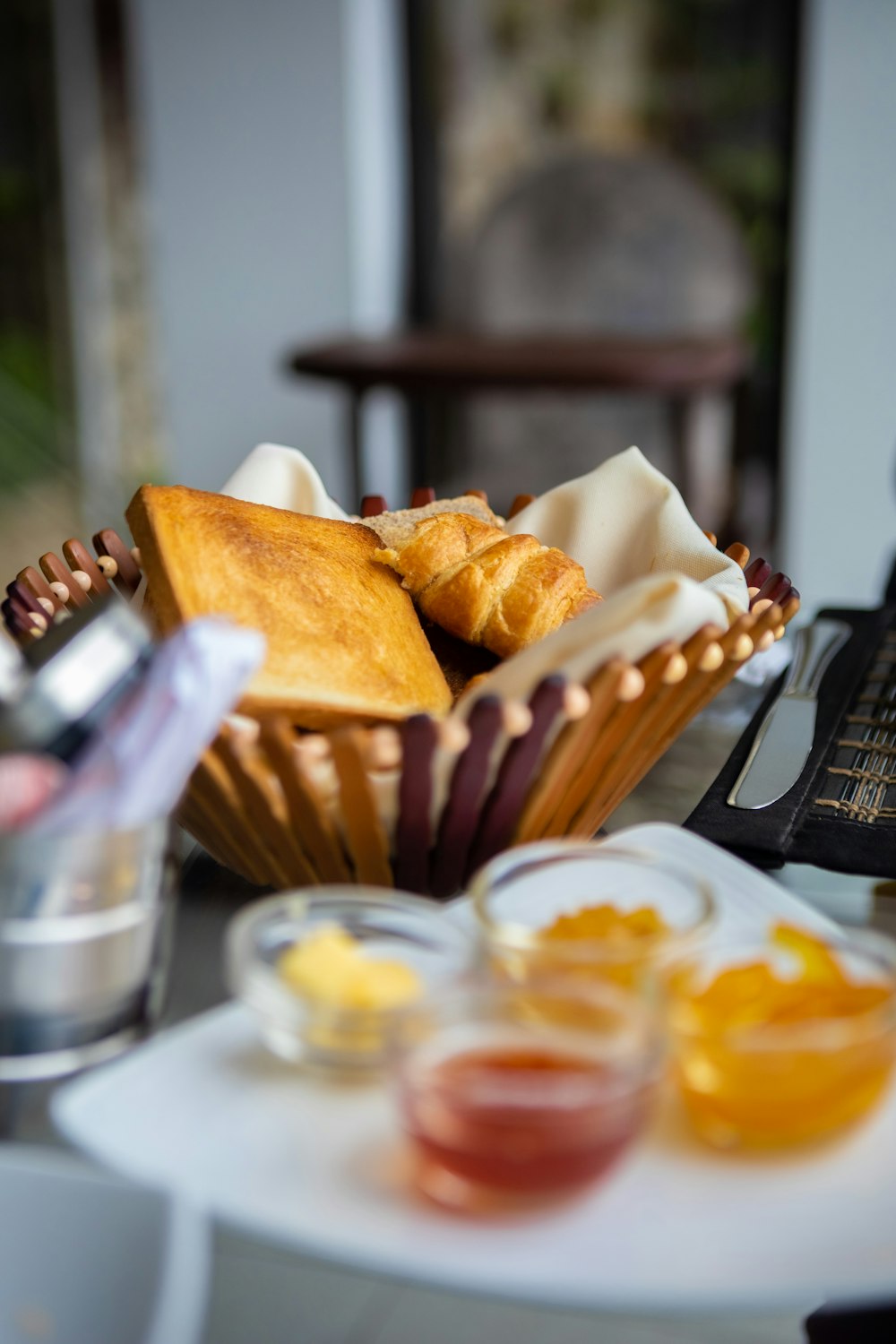 a table with a basket of food on it