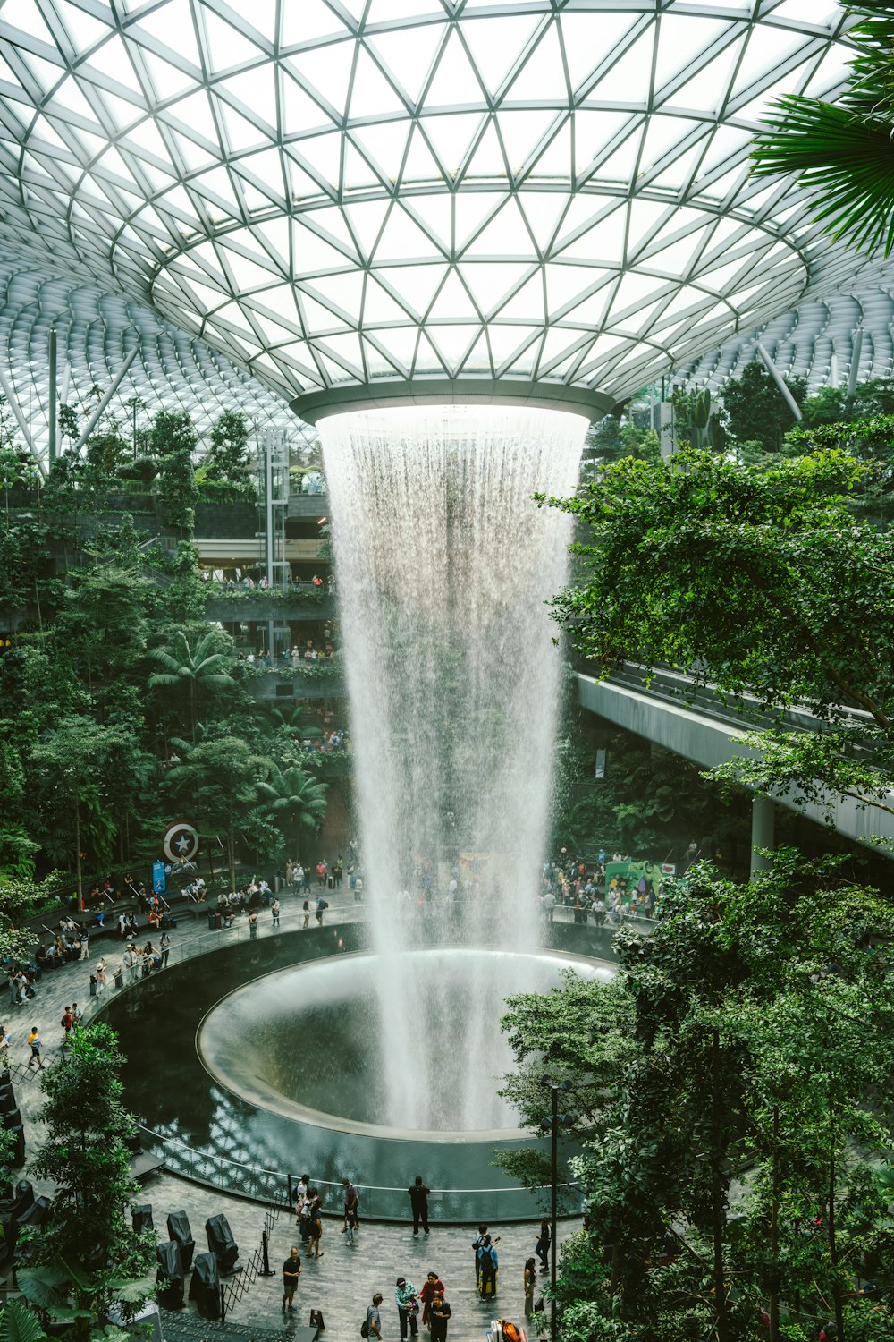 a large waterfall in the middle of a building