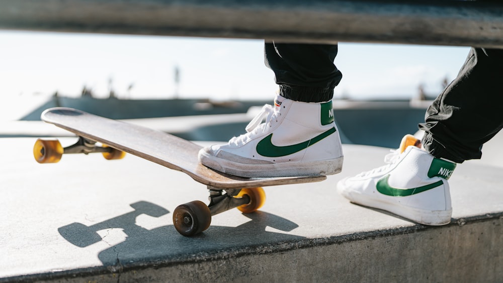 a person standing on top of a skateboard