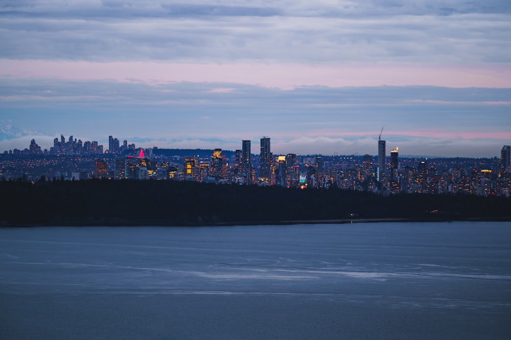 a view of a city at night from across the water