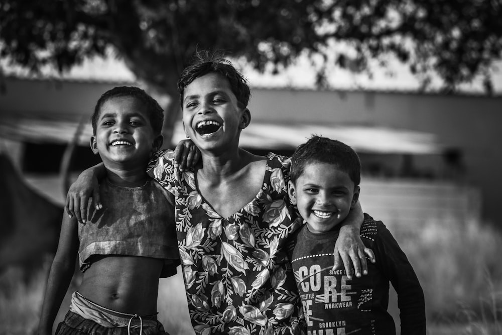 a group of young children standing next to each other