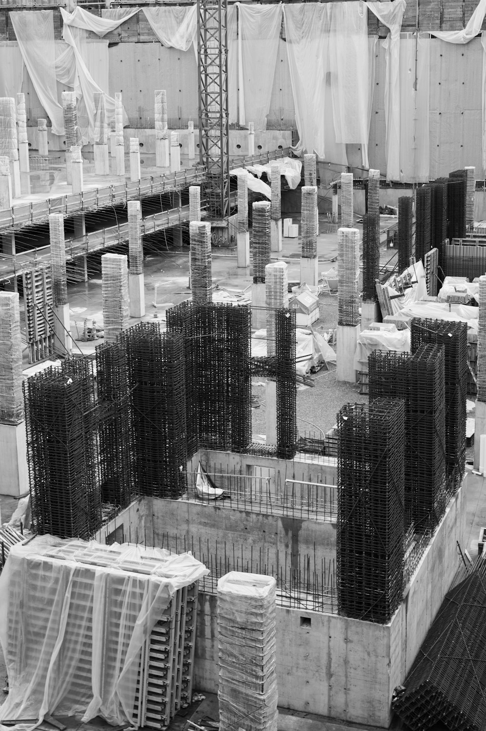 a black and white photo of a construction site