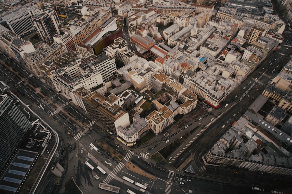 an aerial view of a city with tall buildings