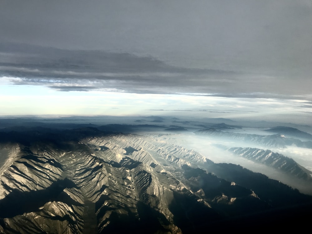 a view of a mountain range from an airplane