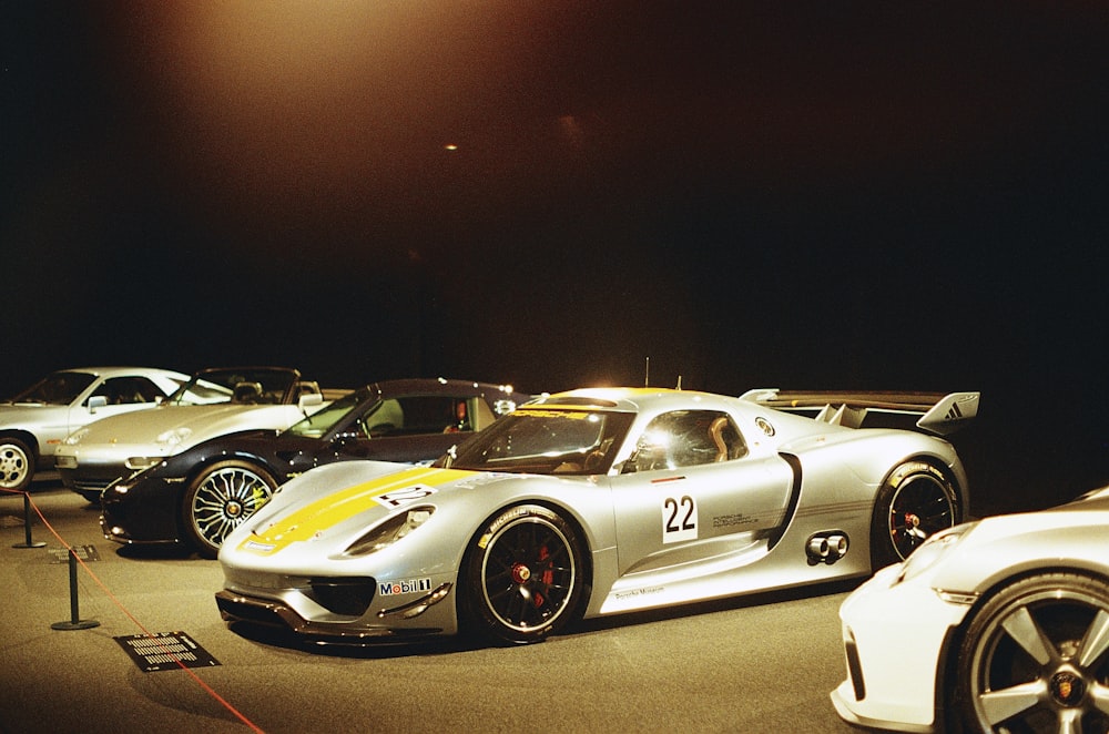 a group of cars parked next to each other in a parking lot