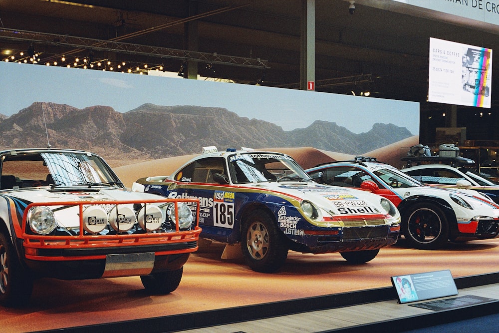 a bunch of cars that are on display