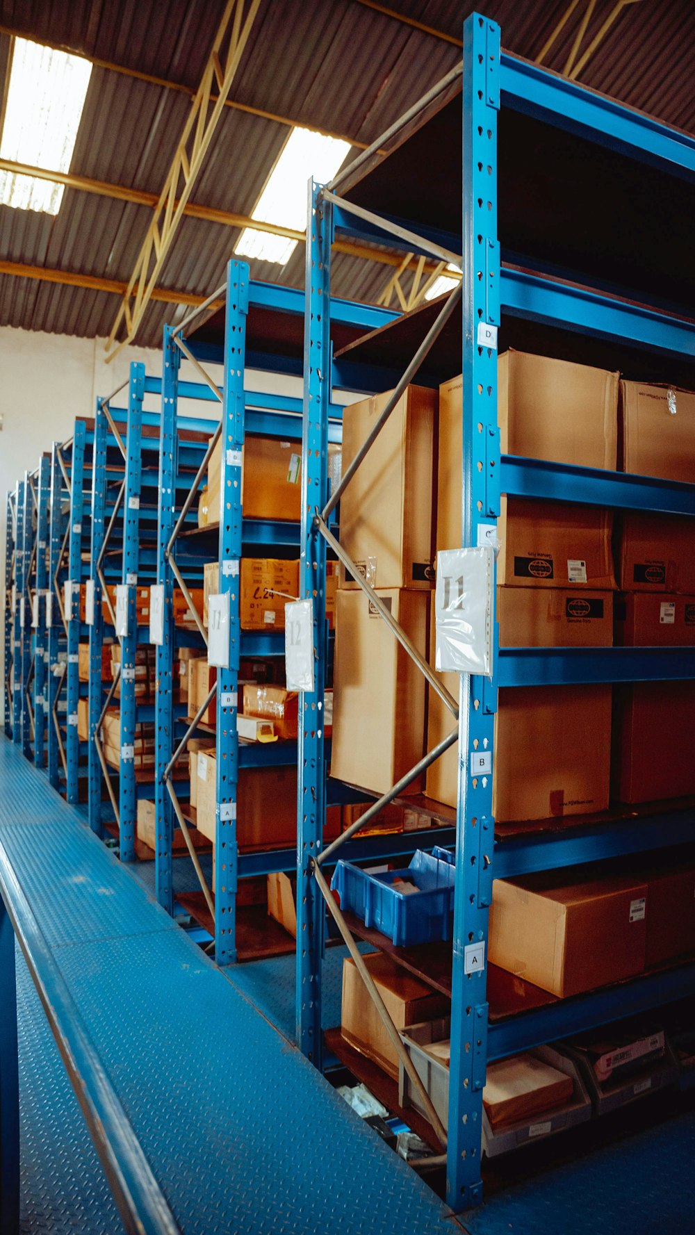 a warehouse filled with lots of shelves filled with boxes